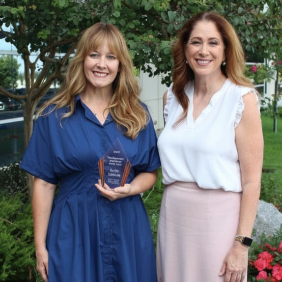 Becky Canham  with County Suprintendent holding award