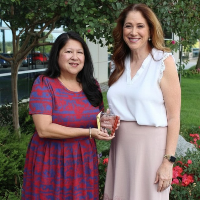 Denise Siguenza  with County Suprintendent holding award